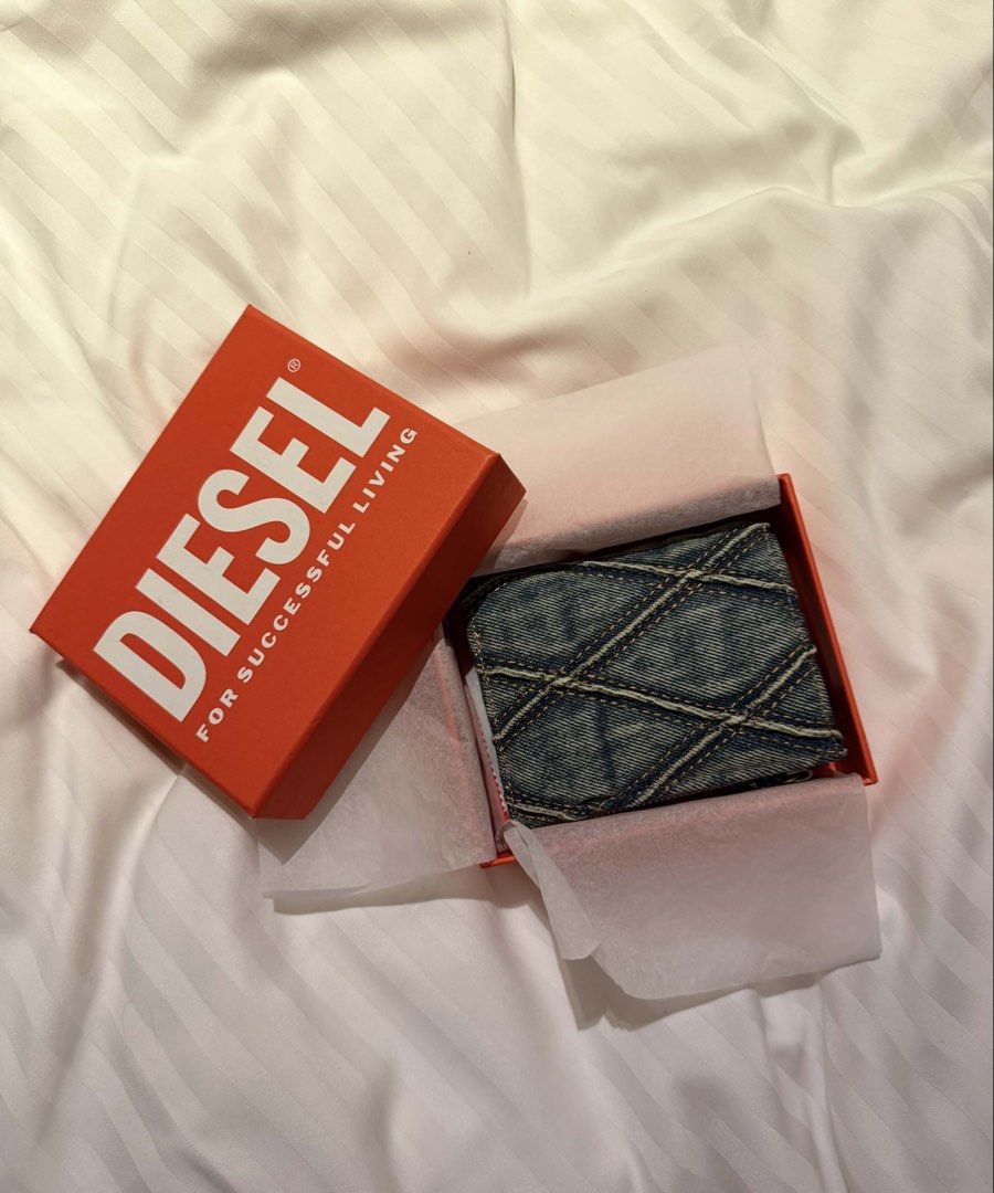 Diesel Denim Quilted Wallet (Category: Luxury Bags & Wallets) located in Paranaque City. Submitted by eleycruz (Listing ID 1437015161, Image 1). Description: - Authentic Diesel wallet - Unique denim design - BRAND NEW, bought @ japan - iniwan na yung box sa japan/no box anymore - Perfect gift or everyday use.