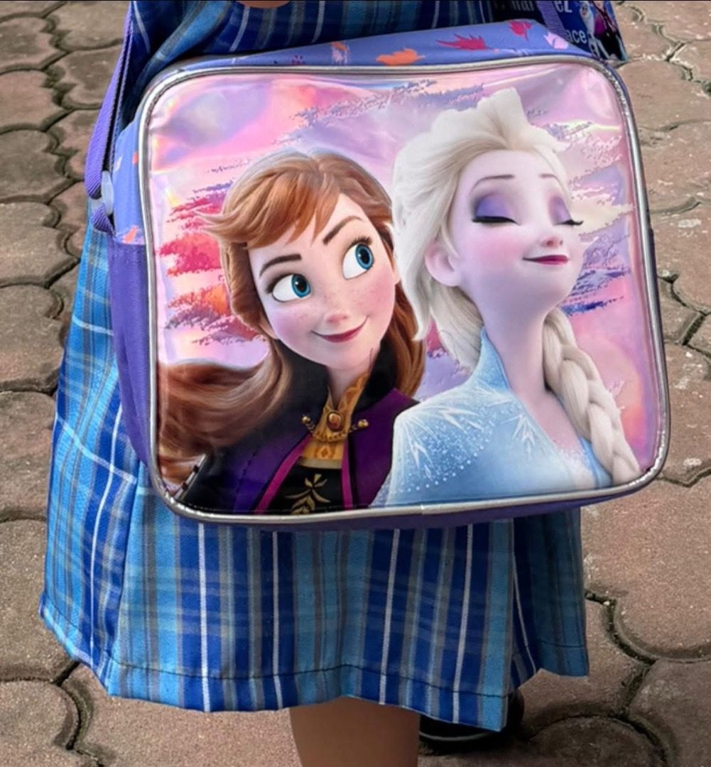 Disney Frozen Trolley Bag (Category: Luxury Bags & Wallets) located in Caloocan City. Submitted by mommy_katmarquez (Listing ID 1436895911, Image 2). Description: For sale❗️❗️ Personal Preloved💜 FROZEN trolley bag Complete inclusions -rain coat of the bag(not used) With scratches on corners but still sturdy Bought in SM STORE FOR ₱4,799 Selling low❗️❗️pm po😊.