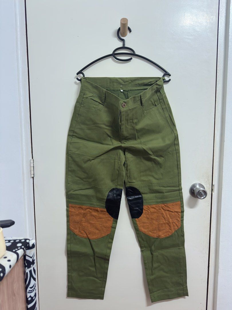Green Patchwork Pants (Category: Jeans) located in Manila. Submitted by hutfris (Listing ID 1436904959, Image 1). Description: - Green pants with patchwork knee design - Button closure - Includes pockets - Made of durable fabric - Stylish and practical.