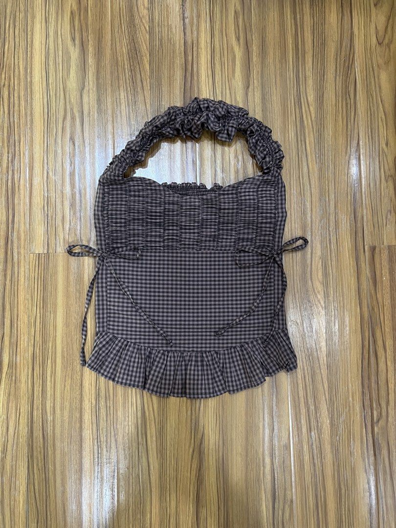 Heure141 The Label Gingham Tutu Scrunchie Halter Top | S-M (Category: Blouses) located in Manila. Submitted by everythingbrandedpreloved_ (Listing ID 1436900827, Image 2). Description: Brand: Heure141 the Label (Filipino Brand) • Sold Out Online (Got it for 1,650) • Brown gingham scrunchie-style halter top with a flattering structured bodice • Ruched/stretchable back for a comfortable and flexible fit • Best fits women’s S–M • Chic black and brow