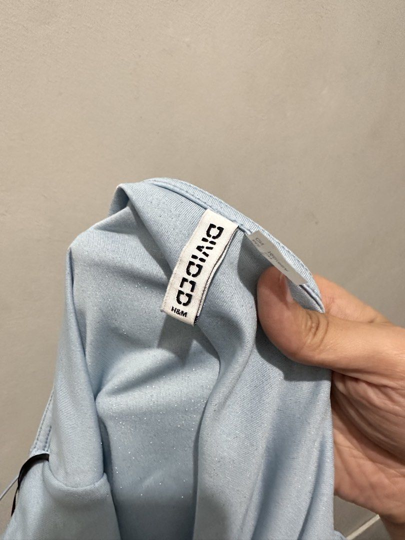 H&M DIVIDED BLUE GLITTER DRESS (Category: Dresses) located in Quezon City. Submitted by jo.1216 (Listing ID 1436962373, Image 2). Description: H&M Blue Glitter Dress Wore once Has runs please see 3rd and 4th pic. Barely noticeable when worn. Dont want to cut it lang Bought for 700php.