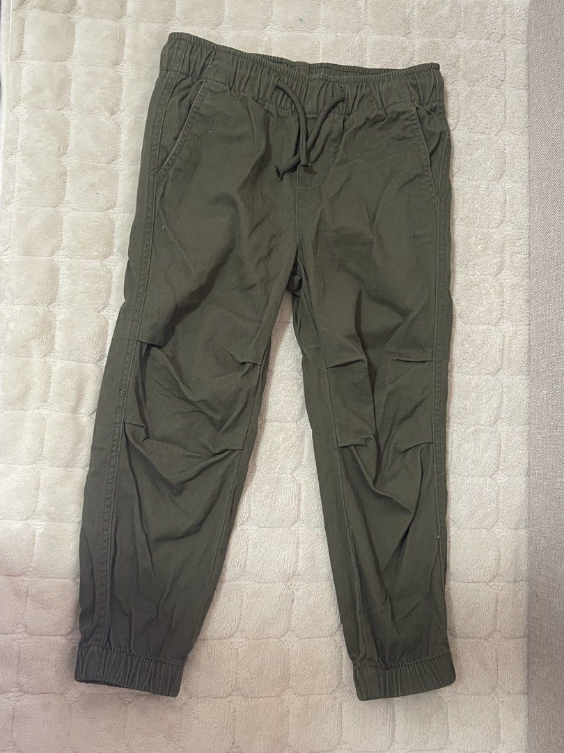 H&M Jogger Elastic Waist Pants (Category: Babies & Kids Fashion) located in San Pedro. Submitted by cchloepreloved (Listing ID 1436860048, Image 1). Description: - H&M jogger pants - Available colors: Olive green, Brown - Size: 3-4 years old (EUR 104) - Features: Elastic waist for comfort - Material: Cotton - Perfect for everyday wear.