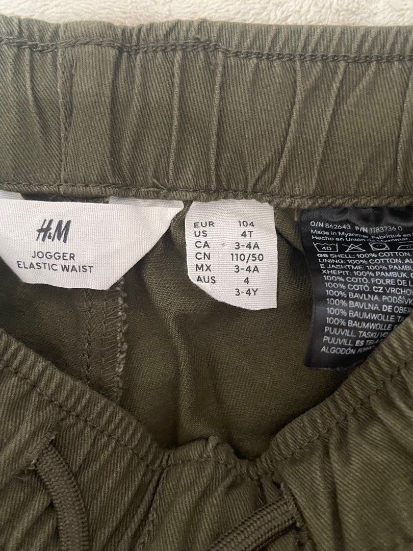 H&M Jogger Elastic Waist Pants (Category: Babies & Kids Fashion) located in San Pedro. Submitted by cchloepreloved (Listing ID 1436860048, Image 2). Description: - H&M jogger pants - Available colors: Olive green, Brown - Size: 3-4 years old (EUR 104) - Features: Elastic waist for comfort - Material: Cotton - Perfect for everyday wear.