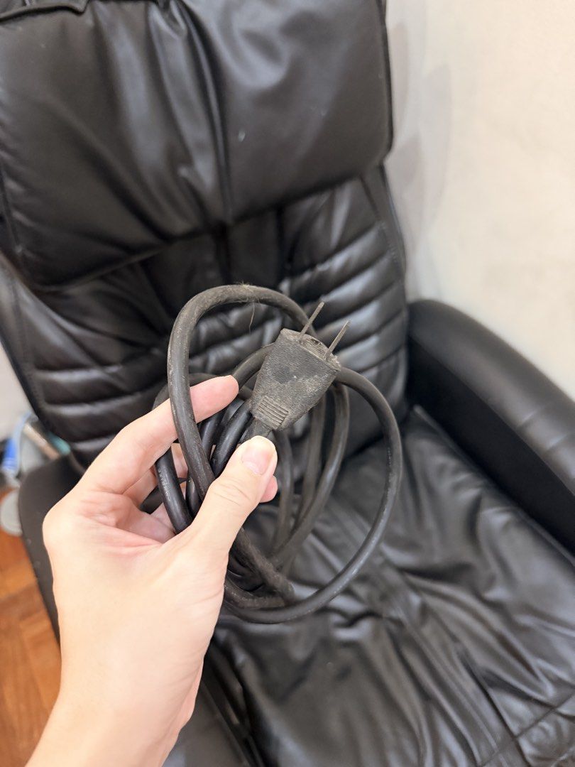 HWE Massage Chair (Category: Massage Devices) located in Manila. Submitted by scoobysnaxx (Listing ID 1436868015, Image 2). Description: - GENUINE Leather Black HWE massage chair - Multiple massage functions: rolling, kneading, tapping, etc. - Adjustable width and speed settings - Power indicator and stop button - Reclining function for comfort - Includes power cord - 110 volt FUSE NEEDS TO BE REPLACED - NEEDS REPAIR NEGOTIABLE.