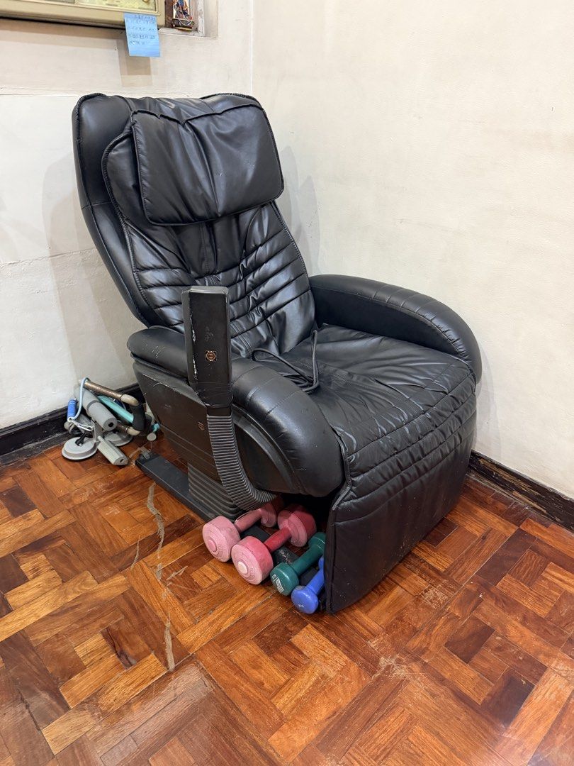HWE Massage Chair (Category: Massage Devices) located in Manila. Submitted by scoobysnaxx (Listing ID 1436868015, Image 1). Description: - GENUINE Leather Black HWE massage chair - Multiple massage functions: rolling, kneading, tapping, etc. - Adjustable width and speed settings - Power indicator and stop button - Reclining function for comfort - Includes power cord - 110 volt FUSE NEEDS TO BE REPLACED - NEEDS REPAIR NEGOTIABLE.