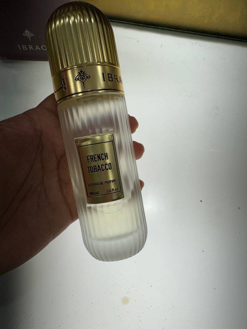 IBRAQ (Category: Fragrance & Deodorants) located in Cyberjaya. Submitted by juliezolkifli (Listing ID 1436923498, Image 3). Description: - Ibraq Purple Heart Diamond Perfume, spanish tobacco , pink sakura , emerald green Diamond - 150ml - Distinctive diamond-shaped bottle - Elegant dark burgundy bottle with white cap - Includes original box - Also available: Pink Diamond Sakura & French Tobacco.