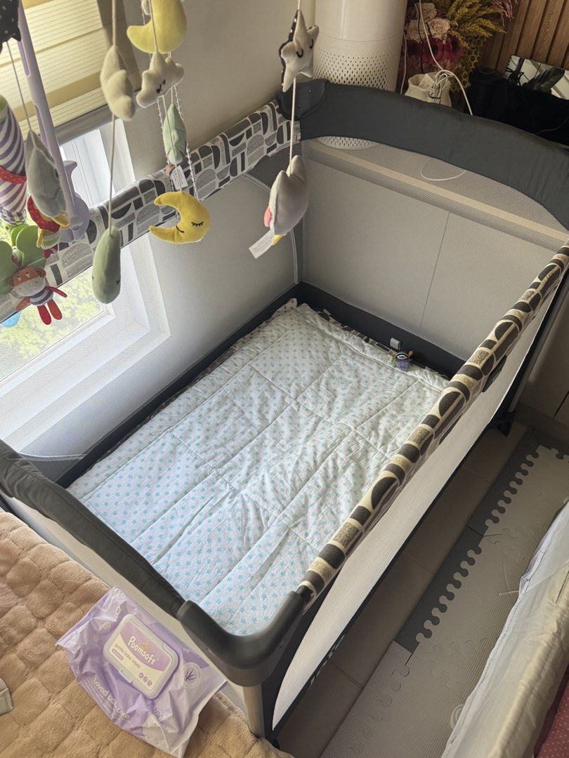 Joie Crib with detachable changing station (Category: Cots & Cribs) located in Quezon City. Submitted by _fab22 (Listing ID 1436834834, Image 2). Description: Bought for 9k Will sell only for 6k Almost brandnew. No wiwi. Wala amoy. Wala sira. Seldom use message lang po paunahan.