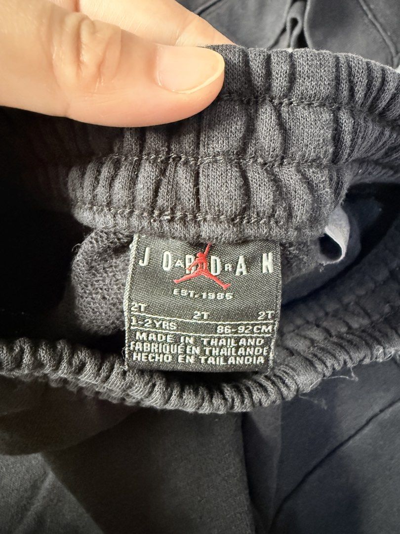 Original Jordan Sweatshirt and Jogger Set - 2T (Category: Babies & Kids Fashion) located in Bulacan. Submitted by ta.klowset (Listing ID 1436868156, Image 3). Description: - Jordan 2-piece set (size 2T). - Includes a black sweatshirt with red sleeves and black joggers. - Sweatshirt features the Jordan logo. - Joggers have a small pocket. - Perfect for your little one's comfort and style..