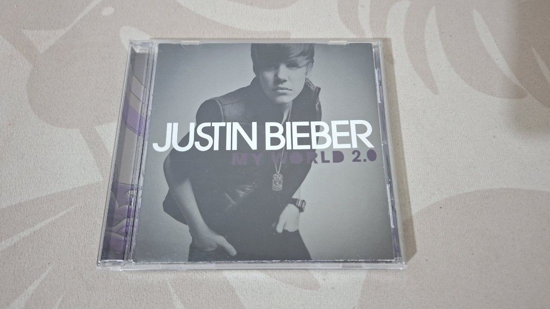 Justin Bieber My World 2.0 CD (Category: CDs & DVDs) located in Imus. Submitted by pick_and_dig (Listing ID 1436866773, Image 1). Description: - Original "My World 2.0" CD by Justin Bieber. - Includes the CD case and disc. - Features hit songs like "Baby", "Somebody to Love", and "U Smile". - Album art features Justin Bieber on the cover. MOP: GCash.