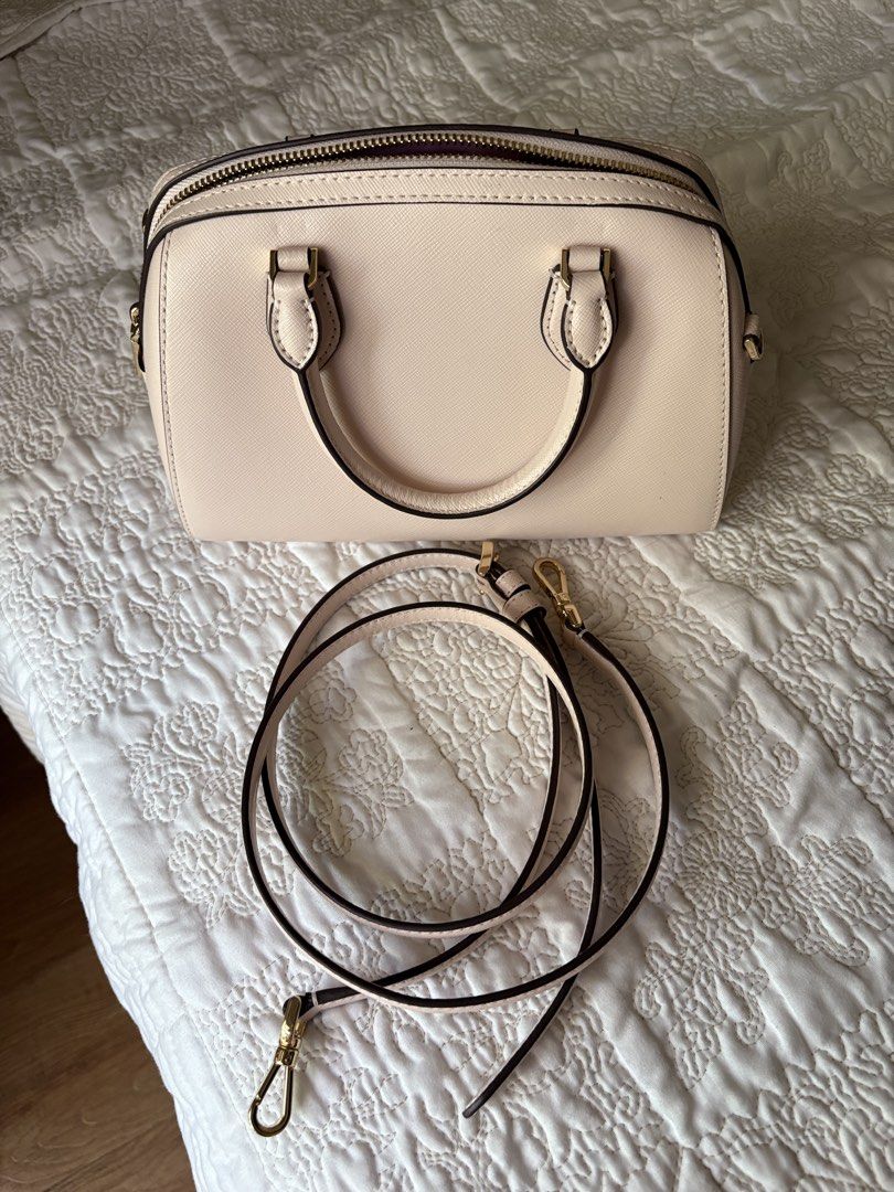 Kate Spade Heart Bag (Category: Luxury Bags & Wallets) located in Pasig City. Submitted by buttercinnamoroll (Listing ID 1436875530, Image 3). Description: -Handbag/Crossbody (w sling) -Only used once. Still in pristine condition. -Pm if you want more pics -Authentic from 🇺🇸 .