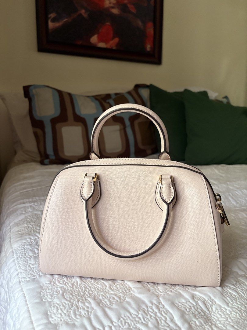 Kate Spade Heart Bag (Category: Luxury Bags & Wallets) located in Pasig City. Submitted by buttercinnamoroll (Listing ID 1436875530, Image 2). Description: -Handbag/Crossbody (w sling) -Only used once. Still in pristine condition. -Pm if you want more pics -Authentic from 🇺🇸 .