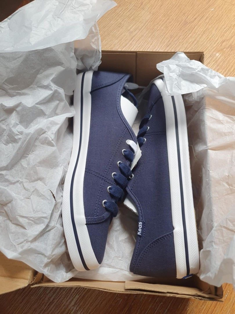 Keds Navy Blue Sneakers us. 7.5 (Category: Sneakers) located in Caloocan City. Submitted by ShopPlus (Listing ID 1436836100, Image 1). Description: - Navy blue Keds sneakers - White soles with navy blue stripe - Keds logo detail - Includes original box - White laces.