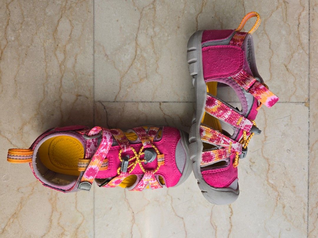 KEEN CNX Sandals - US Size 13 - Multi-Flower Yellow (Category: Babies & Kids Fashion) located in Singapore. Submitted by mingz_11 (Listing ID 1436922237, Image 2). Description: - KEEN CNX sandals - Size 13 - Bright pink and yellow floral design - Minimal sole wear - bleeding of pink into the grey elastic after wash, but it blends in now. - Comes with original box - Comfortable and durable - Perfect for outdoor adventures and everyday wear.