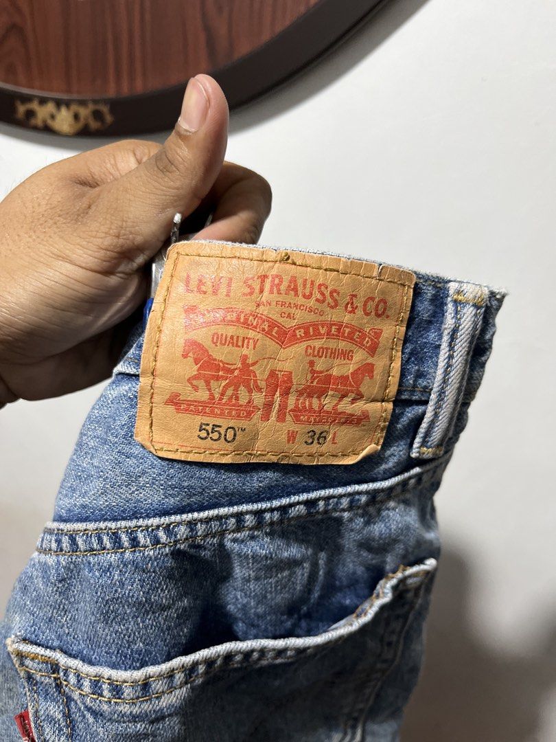 Levi's 550 Denim Shorts (Category: Shorts) located in Cavite. Submitted by renz.rezn (Listing ID 1436899193, Image 2). Description: - Authentic Levi's 550 denim shorts - Light blue wash - Relaxed fit - Size: W36 - Features red tab and button closure - Made with quality denim 600 + ship.