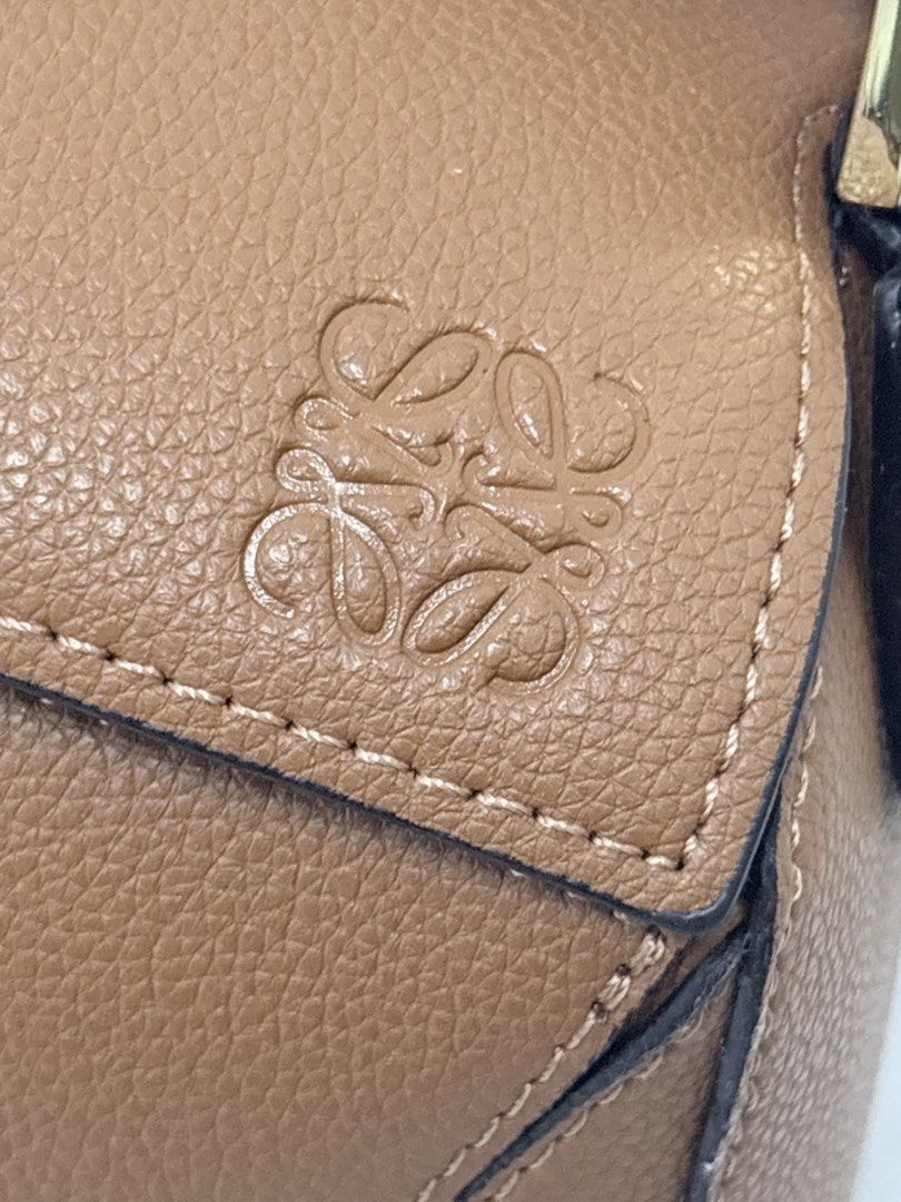 Loewe small puzzle bag in tan (Category: Luxury Bags & Wallets) located in Quezon City. Submitted by herluxe_official (Listing ID 1436973663, Image 3). Description: .