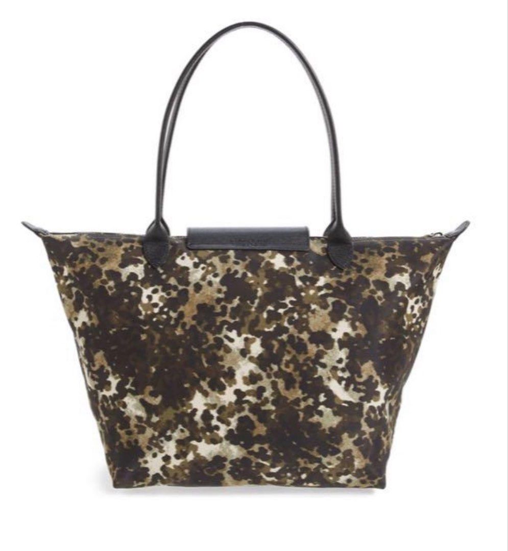Longchamp Limited Edition Bag (Category: Luxury Bags & Wallets) located in Cavite. Submitted by shopnshare (Listing ID 1437012961, Image 3). Description: Bought for P12k at Rustans. Selling half the price. Used a few times No holes, no cracks, no peelings. Just need a little cleaning in the inside due to long time storage. This is a great deal, promise! RFS: no longer using. .