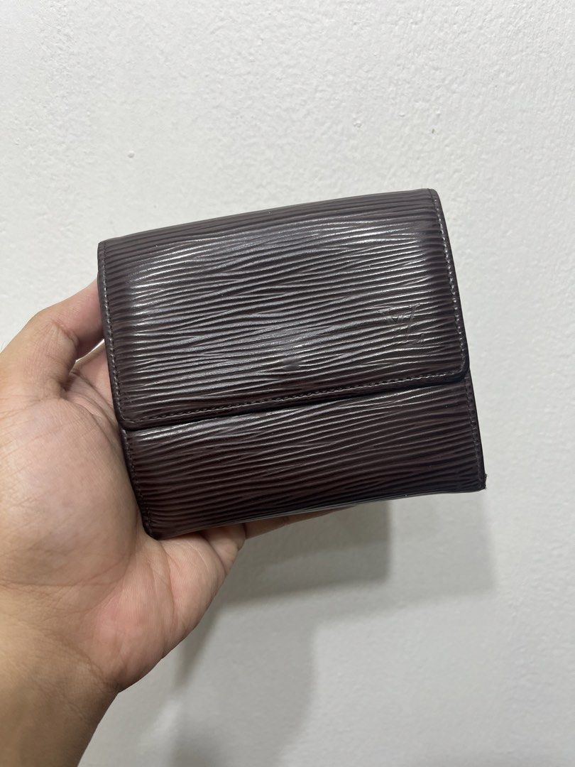 Louis Vuitton Epi Leather Wallet (Category: Luxury Bags & Wallets) located in Manila. Submitted by marketingh98185 (Listing ID 1437011342, Image 1). Description: - Authentic Louis Vuitton wallet - Crafted from brown Epi leather - Interior also brown leather - Multiple card slots - Bill compartment - Coin pocket - Secure snap closure -LV Elise in Epi Leather .