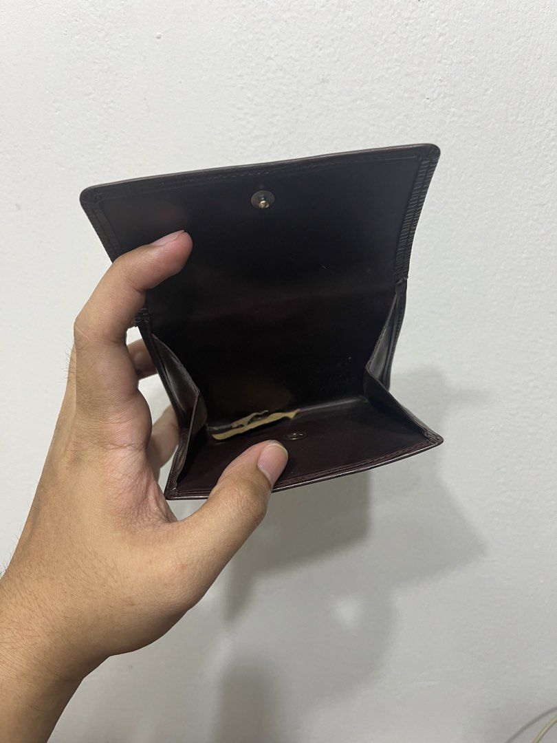 Louis Vuitton Epi Leather Wallet (Category: Luxury Bags & Wallets) located in Manila. Submitted by marketingh98185 (Listing ID 1437011342, Image 3). Description: - Authentic Louis Vuitton wallet - Crafted from brown Epi leather - Interior also brown leather - Multiple card slots - Bill compartment - Coin pocket - Secure snap closure -LV Elise in Epi Leather .