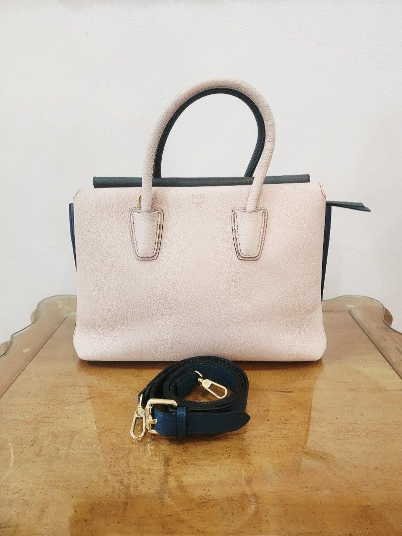 MCM Medium Tri-Color Milla Tote Bag (Category: Luxury Bags & Wallets) located in Valenzuela. Submitted by absolutelychick (Listing ID 1326646883, Image 1). Description: L 12.75" x W 5.75" x H 9" missing hang tag changed sling may dumi po sa isang corner and sa habdle please check photos for reference jrs, lbc, j&t lalamove/grab ready.
