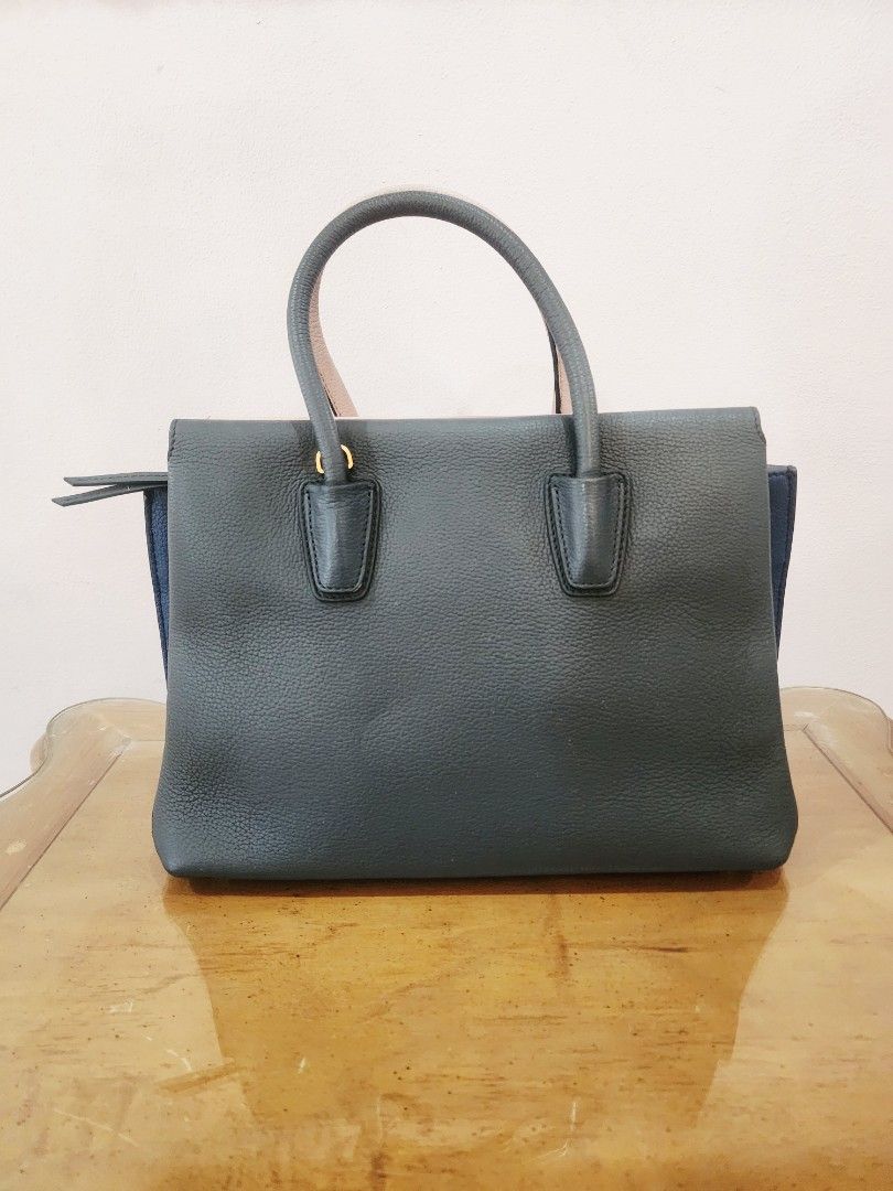 MCM Medium Tri-Color Milla Tote Bag (Category: Luxury Bags & Wallets) located in Valenzuela. Submitted by absolutelychick (Listing ID 1326646883, Image 2). Description: L 12.75" x W 5.75" x H 9" missing hang tag changed sling may dumi po sa isang corner and sa habdle please check photos for reference jrs, lbc, j&t lalamove/grab ready.