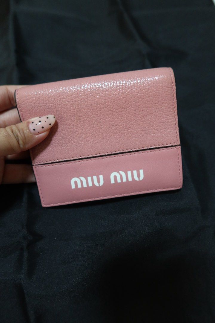 Miu Miu Pink Leather Wallet (Category: Luxury Bags & Wallets) located in Las Pinas. Submitted by katrenperfar (Listing ID 1436831801, Image 3). Description: - Authentic Miu Miu bifold wallet - Pink leather - Features Miu Miu logo - Multiple card slots - Coin compartment - Snap closure - Made in Italy - sourced from Japan.
