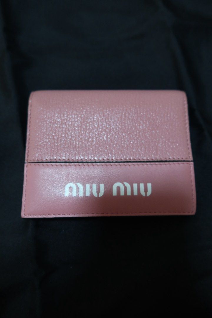 Miu Miu Pink Leather Wallet (Category: Luxury Bags & Wallets) located in Las Pinas. Submitted by katrenperfar (Listing ID 1436831801, Image 2). Description: - Authentic Miu Miu bifold wallet - Pink leather - Features Miu Miu logo - Multiple card slots - Coin compartment - Snap closure - Made in Italy - sourced from Japan.