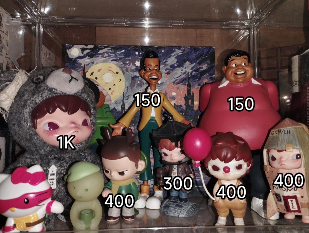 Molly, Pop Mart, and other figurines (Category: Designer & Blind Box Toys) located in Cavite. Submitted by jayjaybarlaan (Listing ID 1436930769, Image 1). Description: Collection of figurines including Molly, Pop Mart, and other characters. Includes a figure with a bear costume, a green figure, a figure with a balloon, and a figure with a hat. Also includes a figure of a man in a suit and a figure of a man in a red shirt. All figures are displaye