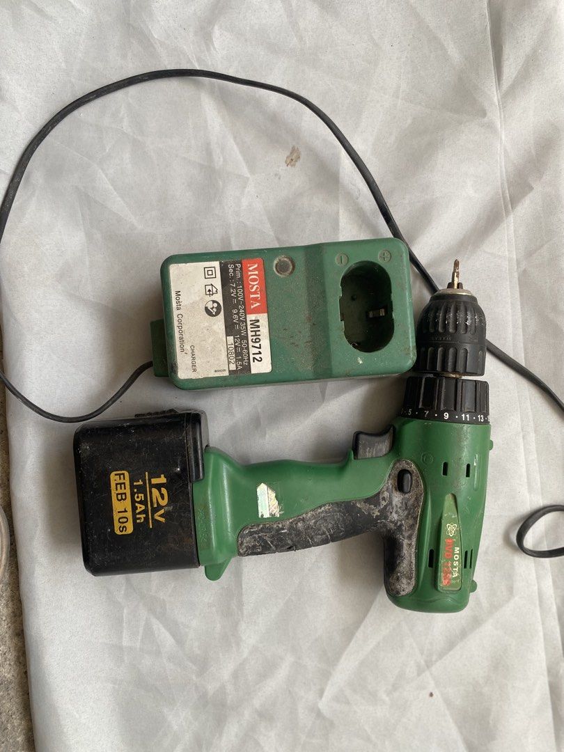 Mosta Cordless Drill with Charger (Category: Construction Tools & Equipment) located in Mabalacat. Submitted by maglalakongkalakal (Listing ID 1436841020, Image 1). Description: - Cordless drill with charger - Includes 12V 1.5Ah battery - Charger model: MH9712 - Green drill body - Battery manufacturing date: FEB 10s - Drill is functional and ready for use - Charger included.