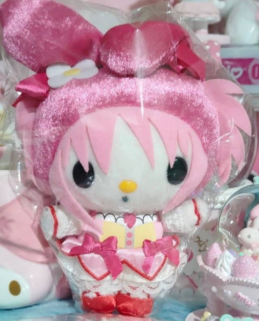 My Melody Madoka Plush Toy (Category: Plushies & Soft Toys) located in San Juan City. Submitted by raremountain_5de9b2 (Listing ID 1436908621, Image 1). Description: - Adorable My Melody plushie - Dressed as Madoka from Madoka Magica - Features a pink dress with bows and lace details - Includes pink hair and a white flower - Still in original packaging - Perfect for Sanrio and Madoka Magica fans and collectors.