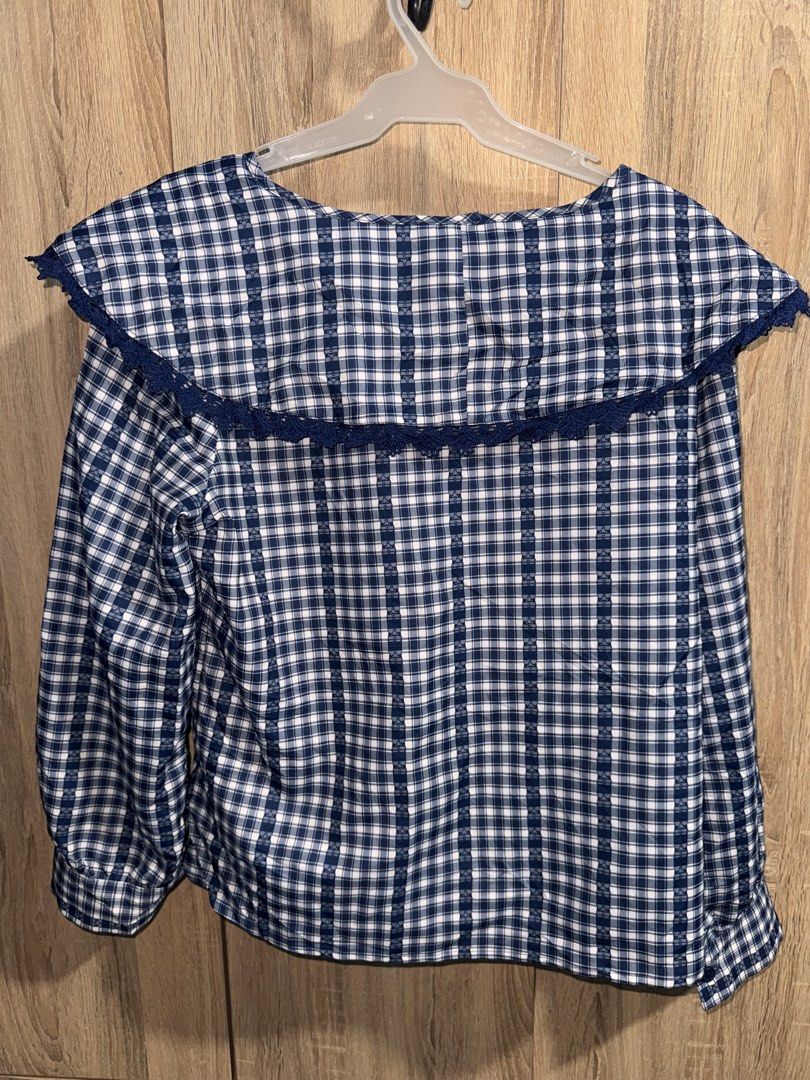 Navy Blue Plaid Blouse with Lace Collar (Category: Blouses) located in Manila. Submitted by chskaiode (Listing ID 1437014119, Image 1). Description: - Navy blue and white plaid blouse - Features a unique lace-trimmed collar - Long sleeves and button-down front - Made of lightweight fabric - Classic and stylish design Size: large-semi xl.