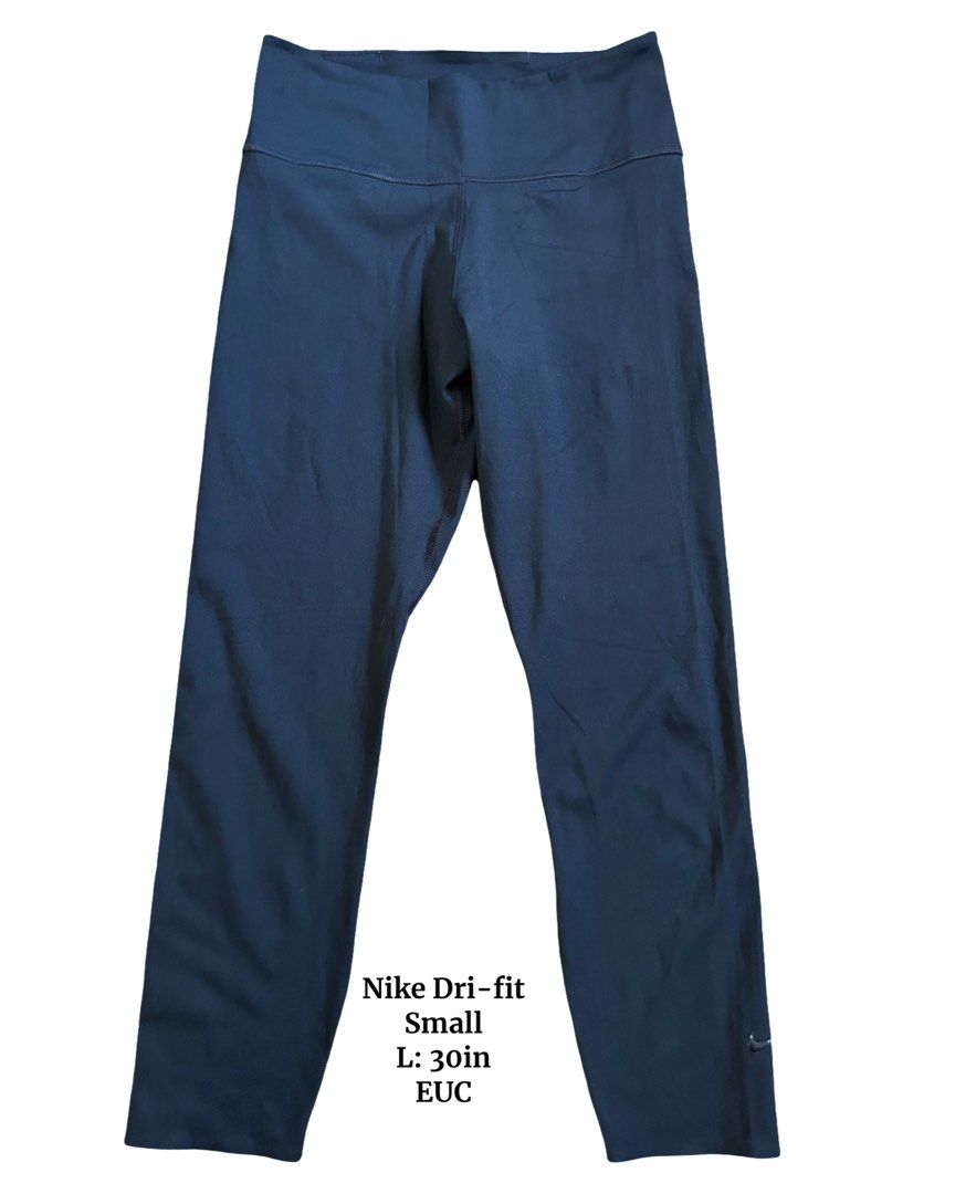 Nike Dri-Fit Leggings - Small (Category: Activewear) located in Imus. Submitted by m_fitness (Listing ID 1436901143, Image 1). Description: Dark blue Nike Dri-Fit leggings. Features a high waistband and a small Nike logo on the lower leg. Size small with a 30-inch length..