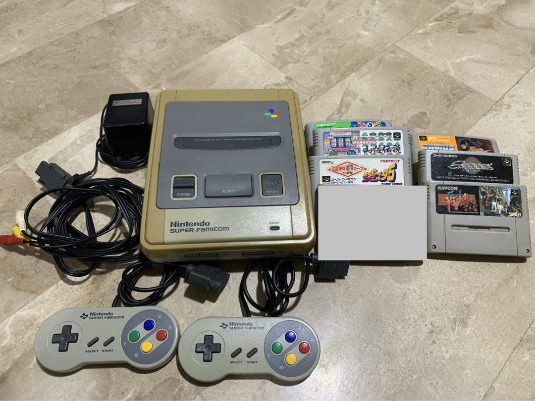 Nintendo Super Famicom Console with Games (Category: Nintendo) located in Quezon City. Submitted by ceejhay_toys (Listing ID 1436867239, Image 1). Description: - Super Famicom console (Japanese version) - Includes orig two controllers,dispaly cable and power adapter(110v)jpn - Comes with 6 game cartridges - Tested and working - Ready to play! - as is condition Good add for your retro collection Fairview q.c Can do shipping by lalamove.