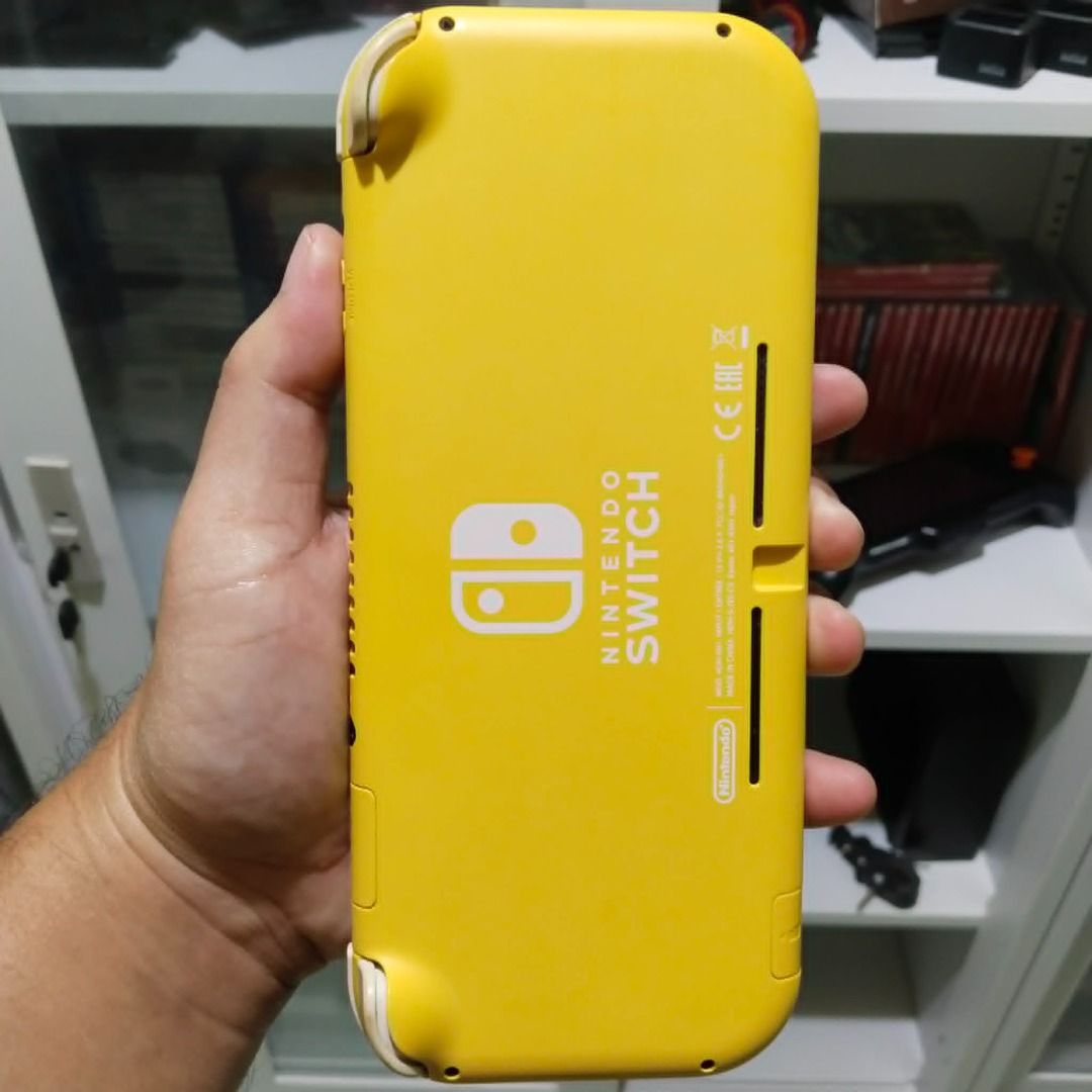 Nintendo Switch Lite ( With small issue ZL hardd press and left analog ...