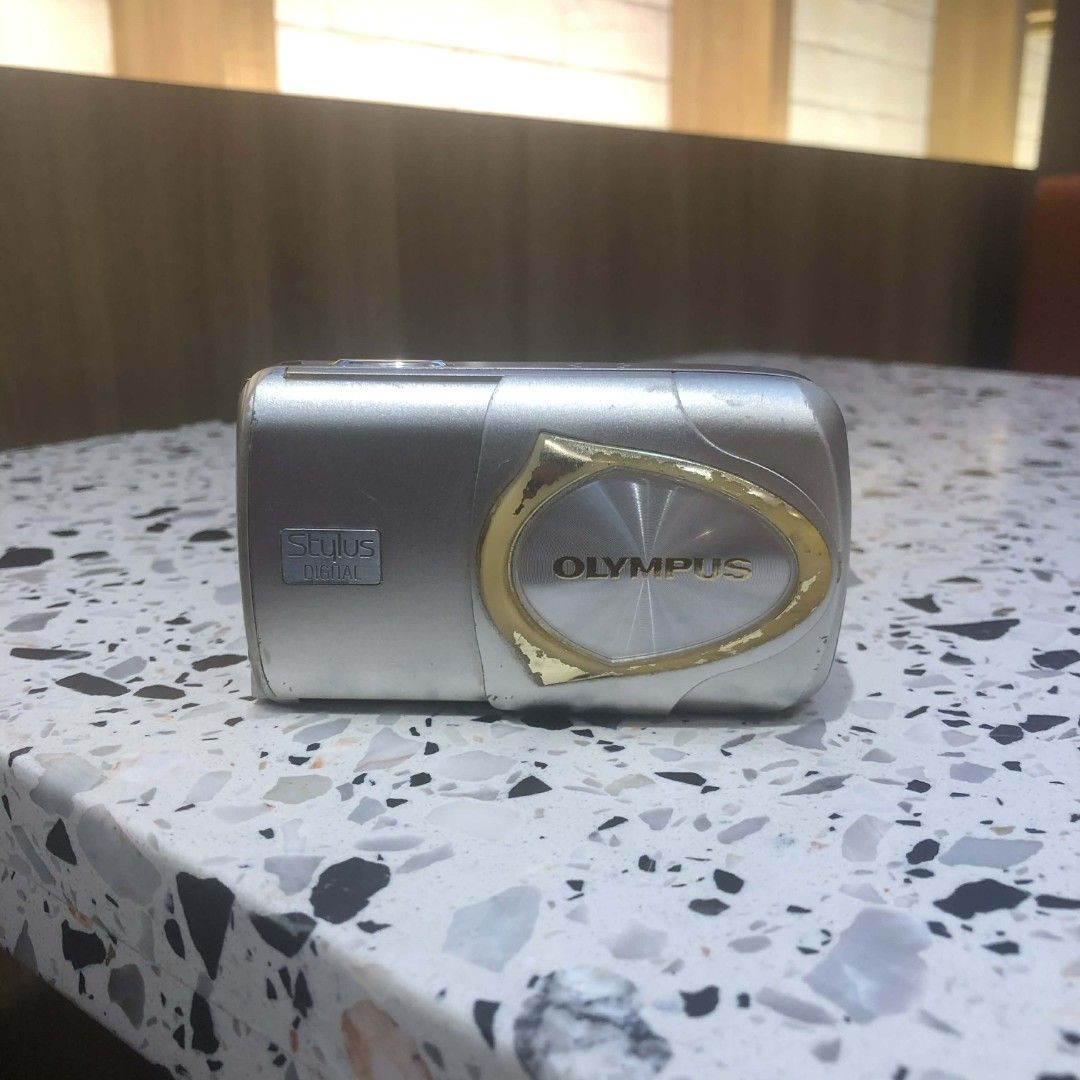Olympus MJU/Stylus 410 Digital Camera Digicam (Category: Cameras) located in Bulacan. Submitted by cheskamarisse13 (Listing ID 1436829139, Image 1). Description: Olympus MJU/Stylus 410 Digital Camera PRICE + sf Specs: - 4 MP CCD Sensor - 8/10 Body Condition - Sliding Lens Cover - Fully Functional - All buttons, flash, video, and zoom are working - Uses XD Card (NOT INCLUDED) - Multiple Modes (Program Auto, Potrait, Indoor, Beach&Snow, Cuisine, La