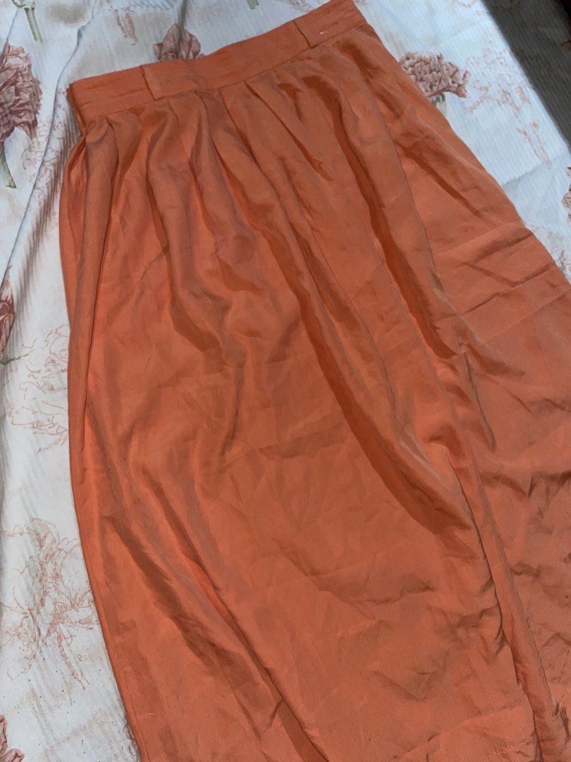 Orange Pleated Maxi Skirt - St. Michael (Category: Skirts) located in Quezon City. Submitted by radiusmile (Listing ID 1436915036, Image 2). Description: - Orange pleated skirt - High-waisted design - Flowing silhouette - Lightweight, warm-weather fabric - Button and zipper closure - Solid color for easy pairing - Garterized back so stretchable - Waistline: 30-34 inches - Length: 31 inches.