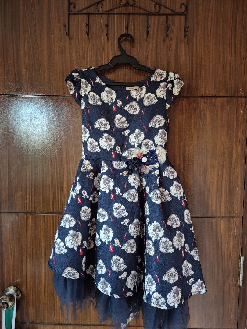 Periwinkle Floral Dress (Category: Babies & Kids Fashion) located in Manila. Submitted by trying_2_declutter (Listing ID 1436920221, Image 1). Description: RFS: Decluttering Price negotiable - Dark blue/navy blue dress with floral design - Features a bow at the back - Tulle underskirt - Size: 12Y - For special occasions - Brand: Periwinkle .
