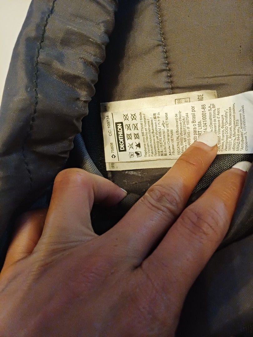 Quechua Arpenaz Backpack (Category: Backpacks) located in Imus. Submitted by bagginholicetc. (Listing ID 1436932566, Image 2). Description: 840 LAST PRICE FOR 500 pesos GOODS PA LALABHAN NYO LANG - Quechua Arpenaz backpack - Color: Dark grey and orange - Adjustable straps - Multiple compartments - Side pockets - Top flap closure - Designed for outdoor use - Brand and model visible.