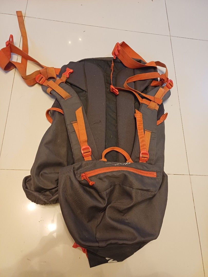Quechua Arpenaz Backpack (Category: Backpacks) located in Imus. Submitted by bagginholicetc. (Listing ID 1436932566, Image 3). Description: 840 LAST PRICE FOR 500 pesos GOODS PA LALABHAN NYO LANG - Quechua Arpenaz backpack - Color: Dark grey and orange - Adjustable straps - Multiple compartments - Side pockets - Top flap closure - Designed for outdoor use - Brand and model visible.