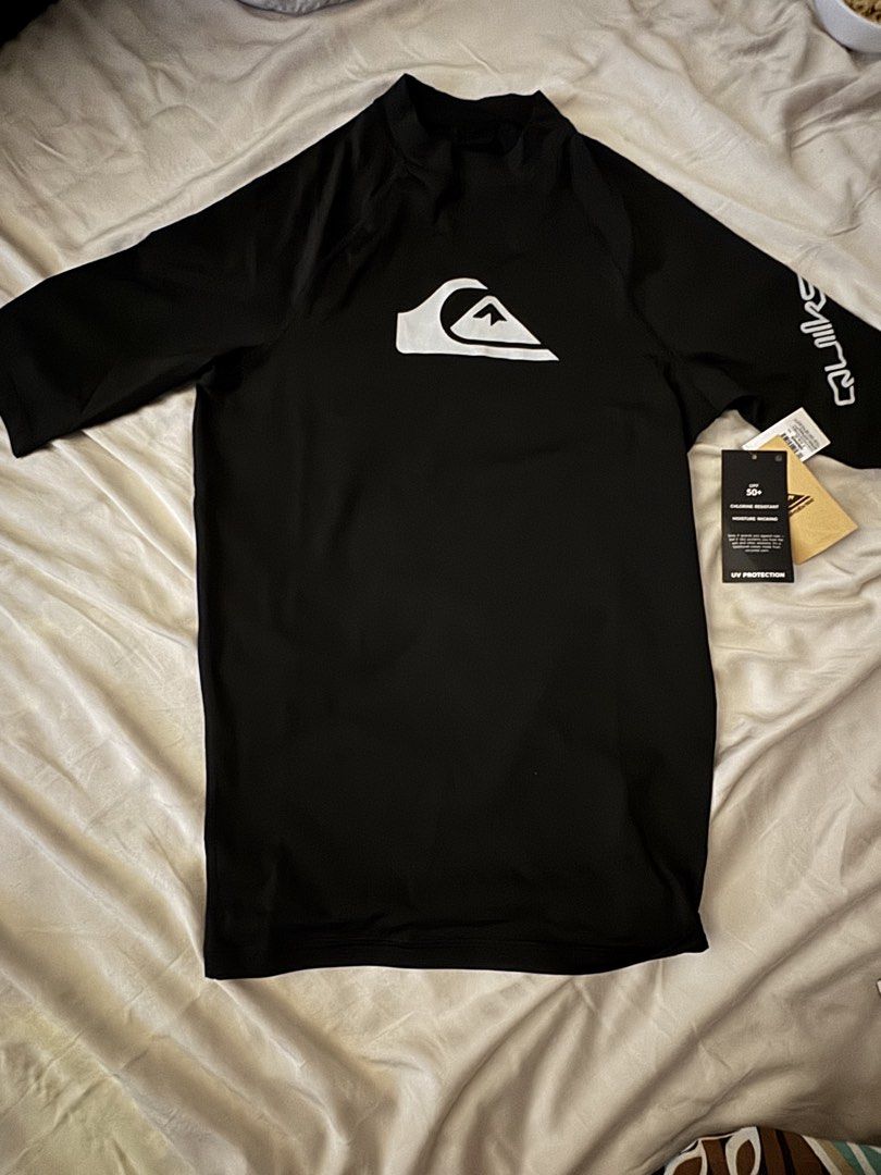 Quiksilver All Time SS ID-RS Rashguard (Category: Activewear) located in Manila. Submitted by crazycat13 (Listing ID 1436846391, Image 1). Description: - Brand new Quiksilver rashguard - Features a sleek black design - Quiksilver logo on chest and sleeve - Size: S (170/88A) - Made in Vietnam - Includes original tags - Original price: ₱2490.00.