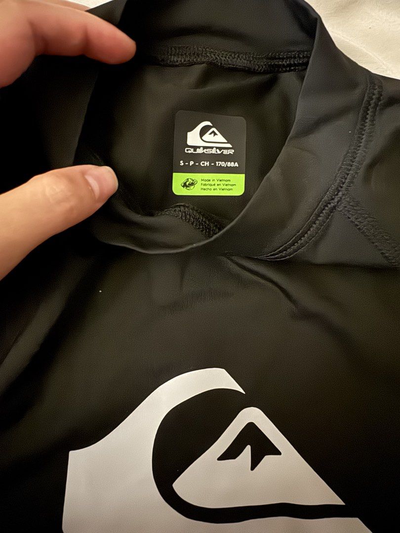 Quiksilver All Time SS ID-RS Rashguard (Category: Activewear) located in Manila. Submitted by crazycat13 (Listing ID 1436846391, Image 2). Description: - Brand new Quiksilver rashguard - Features a sleek black design - Quiksilver logo on chest and sleeve - Size: S (170/88A) - Made in Vietnam - Includes original tags - Original price: ₱2490.00.
