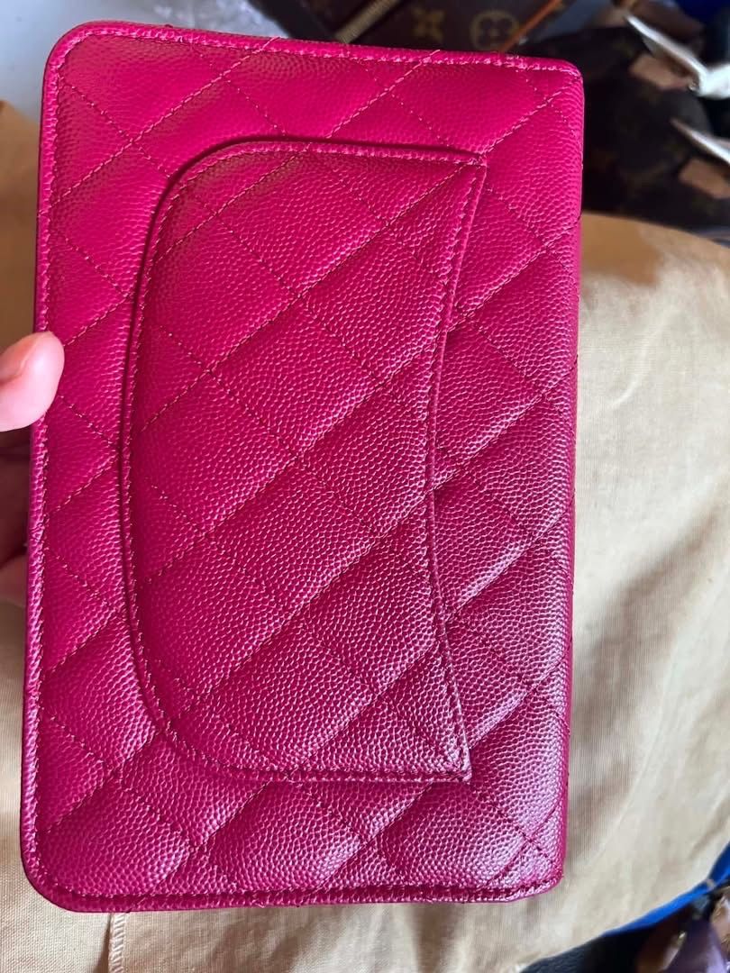 Quilted Chanel Wallet on Chain (Category: Luxury Bags & Wallets) located in Quezon City. Submitted by hellopatchi (Listing ID 1436993569, Image 3). Description: Woc Caviar GHW Microchipped Onhand pinas - Authentic Chanel Wallet on Chain - Stunning pink color - Quilted design - Elegant chain strap - Secure flap closure with snap button - Multiple compartments for organization - Includes a zippered pocket - Features the iconic Chanel logo.