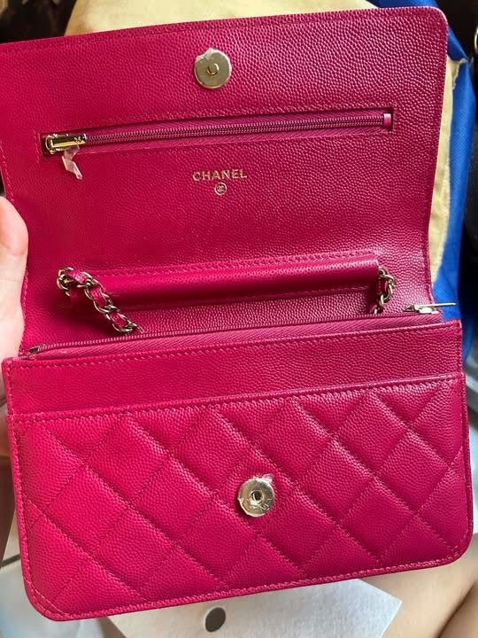 Quilted Chanel Wallet on Chain (Category: Luxury Bags & Wallets) located in Quezon City. Submitted by hellopatchi (Listing ID 1436993569, Image 2). Description: Woc Caviar GHW Microchipped Onhand pinas - Authentic Chanel Wallet on Chain - Stunning pink color - Quilted design - Elegant chain strap - Secure flap closure with snap button - Multiple compartments for organization - Includes a zippered pocket - Features the iconic Chanel logo.