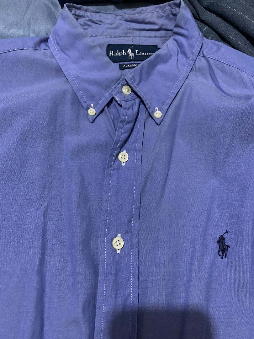 Ralph Lauren Classic Fit Button-Down Shirt (Category: Tshirts & Polo Shirts ) located in Angeles City. Submitted by icqnic (Listing ID 1436903660, Image 1). Description: - Ralph Lauren button-down shirt - Light blue - Classic fit - Features the iconic polo player logo - Button-down collar and long sleeves - Size: 16-32 payment first via g plus sf sale firm price.