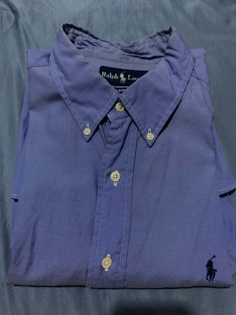 Ralph Lauren Classic Fit Button-Down Shirt (Category: Tshirts & Polo Shirts ) located in Angeles City. Submitted by icqnic (Listing ID 1436903660, Image 3). Description: - Ralph Lauren button-down shirt - Light blue - Classic fit - Features the iconic polo player logo - Button-down collar and long sleeves - Size: 16-32 payment first via g plus sf sale firm price.