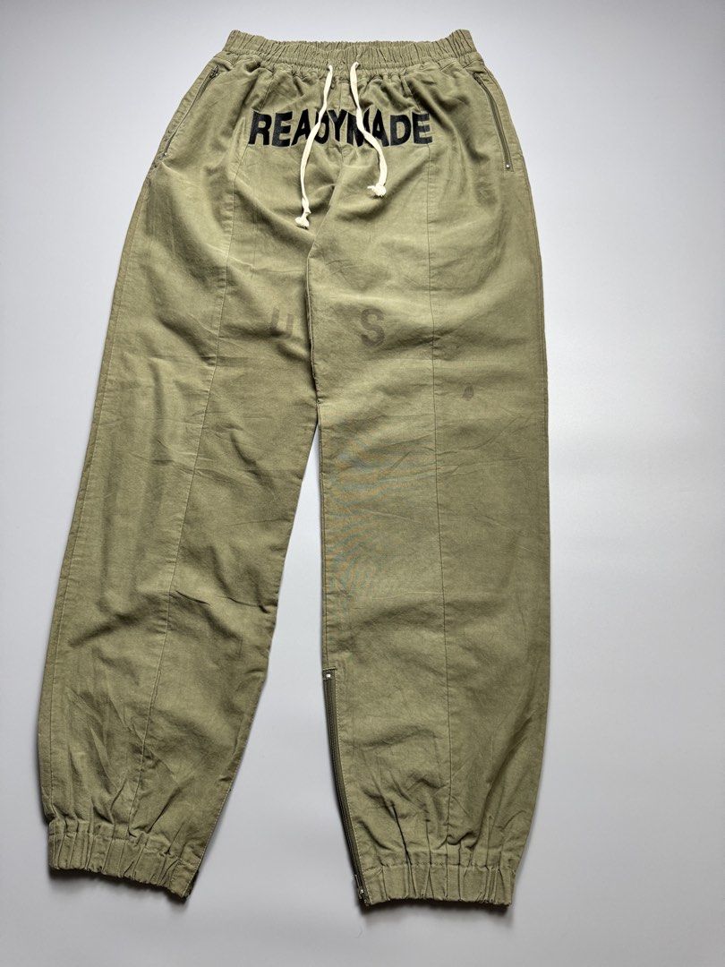 Readymade - Embroidered Logo Cargo Track - Pants (Category: Joggers) located in Quezon City. Submitted by japon_rose (Listing ID 1436925974, Image 2). Description: FOR SALE: GUARANTEED AUTHENTIC ❗️ Mens/ Readymade - Embroidered Logo Cargo Track - Pants Size: 28 or Medium Mens Length: 43 Waist: 28-33 Inseam: 31 Knee: 10.5 Leg Opening: 5.5 W/ zipper Front Rise: 13 Back Rise: 14.5 (MEASURED IT BY INCHES) 9.5/10 Overall condition In excellent conditi