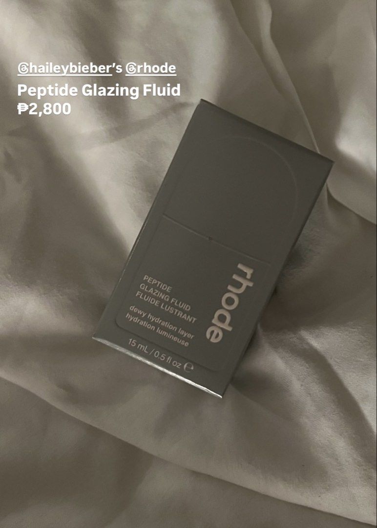 Rhode Peptide Glazing Fluid (Category: Face Care) located in Cebu City. Submitted by theextrawardrobe (Listing ID 1436840306, Image 1). Description: - Rhode Peptide Glazing Fluid - Creates a dewy hydration layer - From @rhode by @haileybieber - FULL SIZE Simple, modern packaging.