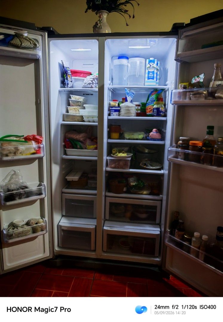 Samsung Side-by-Side Refrigerator (Category: Refrigerators and Freezers) located in Manila. Submitted by anj2123 (Listing ID 1436906458, Image 2). Description: - Samsung side-by-side refrigerator - Stainless steel finish - Double doors - Multiple interior shelves and drawers - Interior lighting - Good working condition - Digital display.