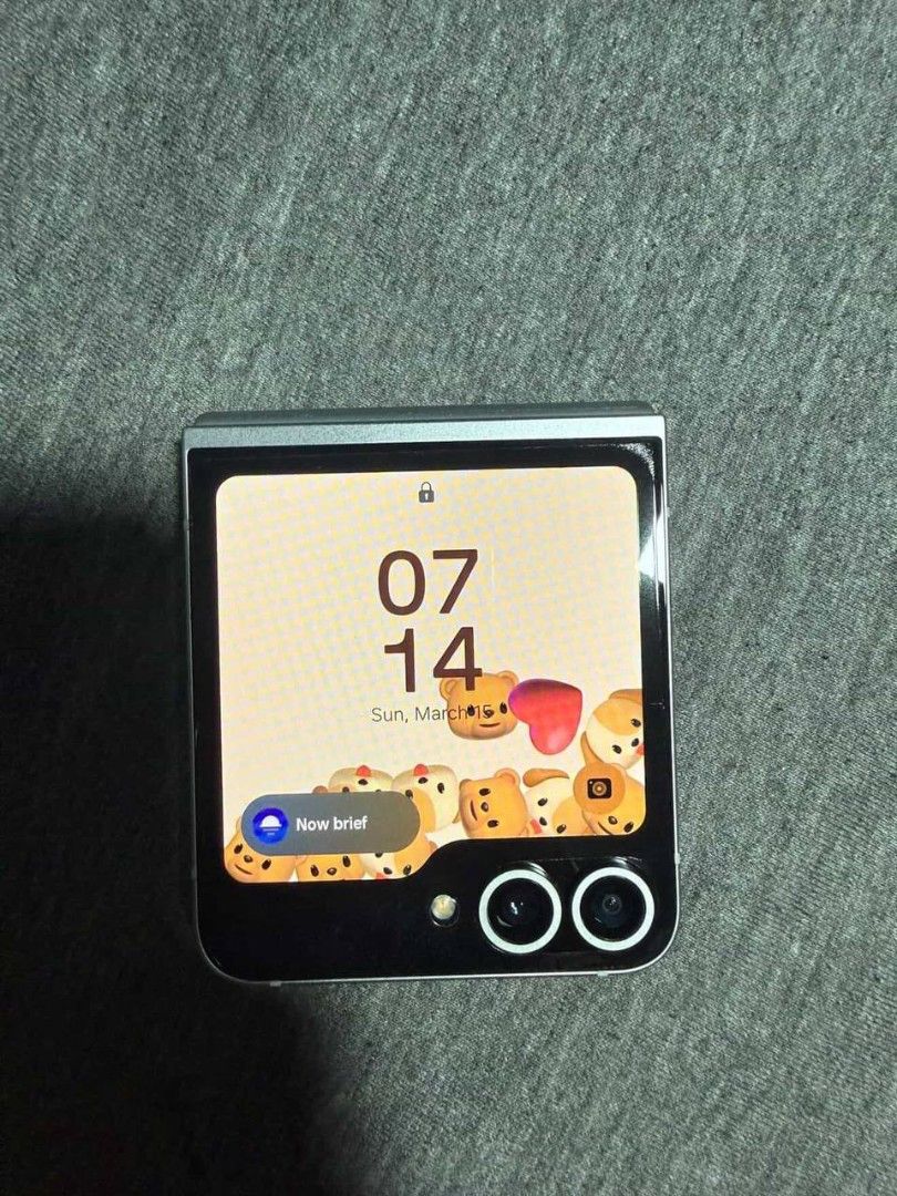 Samsung ZFlip 6 (Category: Samsung) located in Manila. Submitted by auratron (Listing ID 1436847213, Image 1). Description: Samsung zflip 6 Color: gray SPECS ● DUAL SIM ● Processor: Qualcomm Snapdragon 8 Gen 3 for Galaxy (4 nm). ● Memory & Storage: 12GB RAM, 256GB ● Main Display: 6.7-inch FHD+ (2640 x 1080) Dynamic AMOLED 2X, 120Hz adaptive refresh rate. ● Cover Display: 3.4-inch Super AMOLED (720 x 748). ● Rear Camera: 50MP f/1.8 (Wide) with OIS