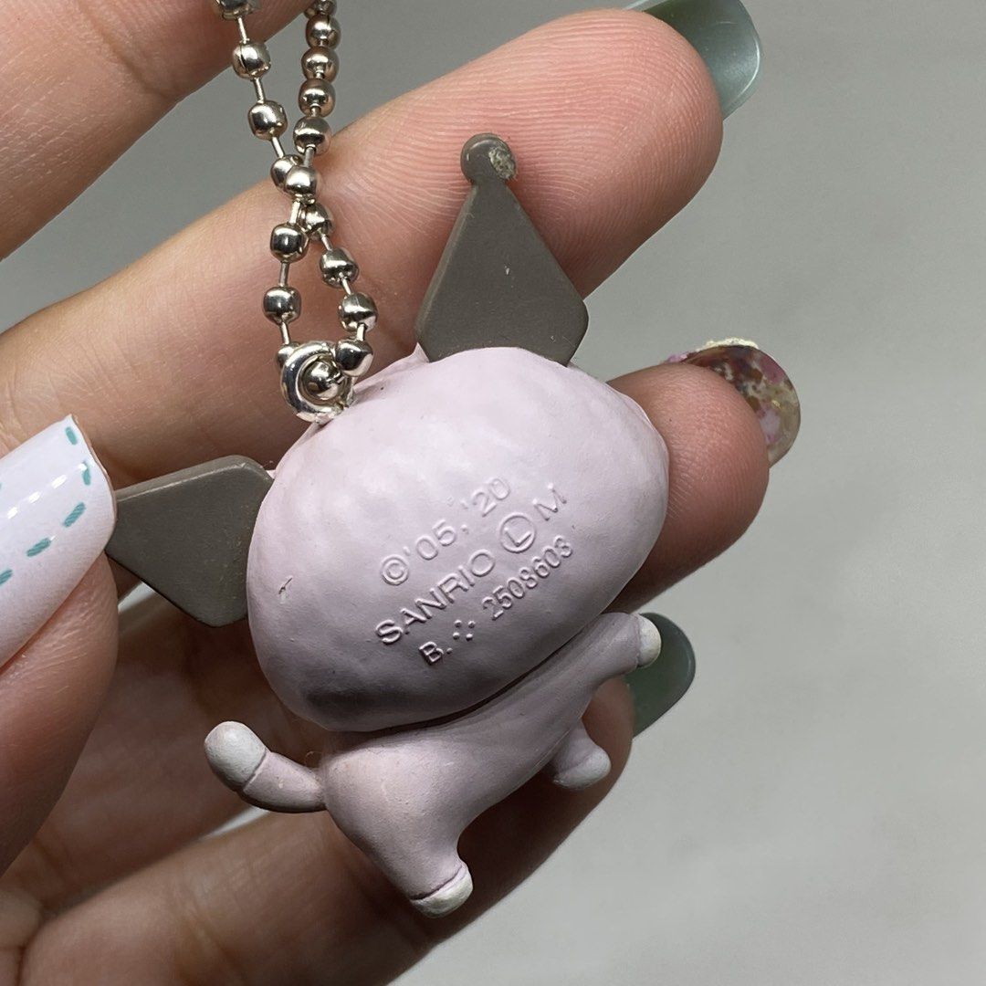SANRIO KUROMI KEYCHAIN CAT CHARM (Category: Character Goods) located in Quezon City. Submitted by kitsune.treasures (Listing ID 1436900146, Image 3). Description: *First to pay policy! *1 day reservation only. Failure to pay on time, auto cancel. 📍Quezon City * MOD: J&T | Lalamove * MOP: GCASH | BPI 📦ON HAND AND READY TO SHIP CONDITION: WHAT YOU SEE IS WHAT YOU GET. Dimensions: Kindly check the photos for the actual measurements. Please check a