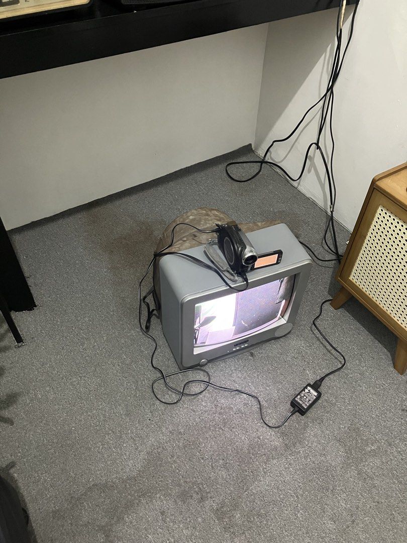 sharp crt tv 14" + sony handycam w/night vision (Category: Video Cameras) located in Pasig City. Submitted by findshyt (Listing ID 1436888681, Image 2). Description: sharp crt tv 14" + sony handycam w/night vision 220volts plug and play good for your coffee shop or clothing store pasig maybunga pm for more infos.